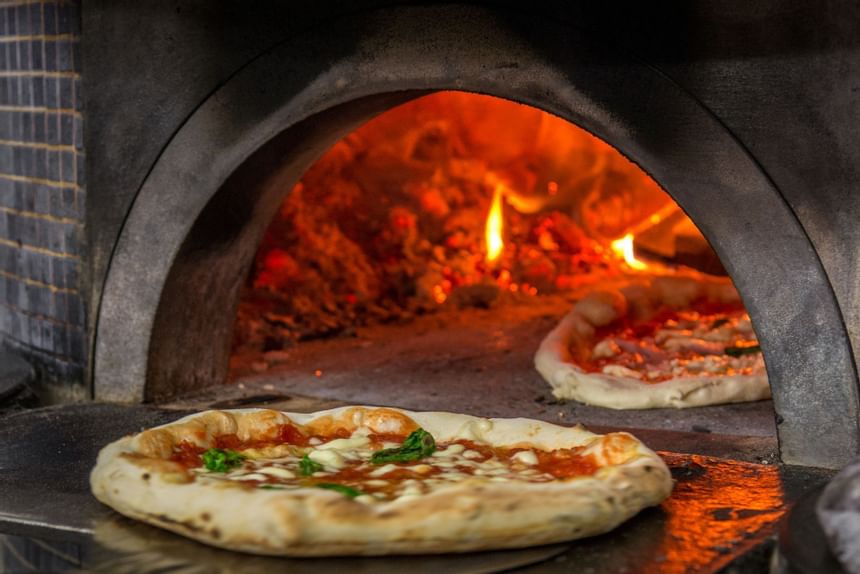 Closeup on pizzas cooking at Sunseeker Resort