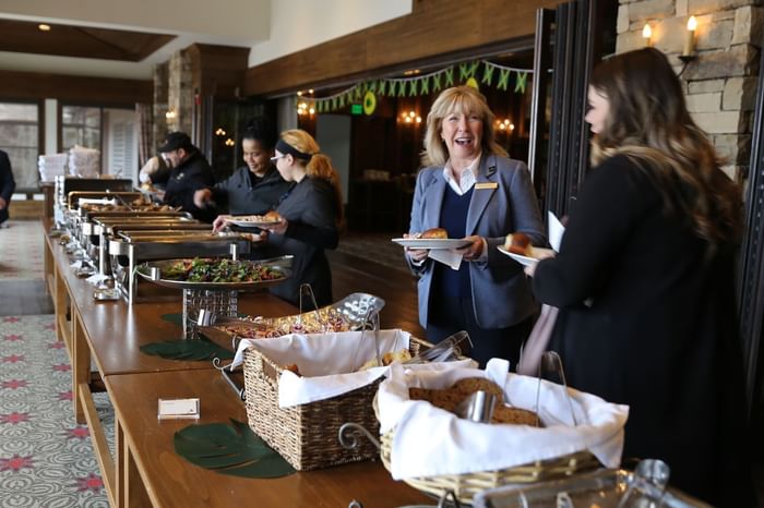 Guests enjoying the buffet at Stein Eriksen Lodge