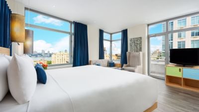 a bed and tv in a hotel room