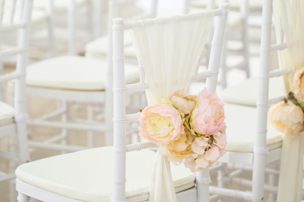 flowers on wedding ceremony chairs at villiers hotel buckingham