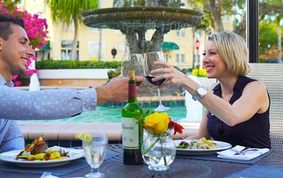 Couple dining by the fountain at Safety Harbor Resort & Spa