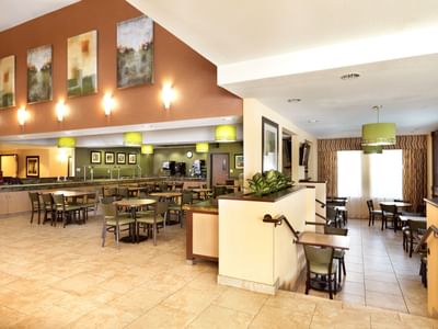 Spacious dining area arranged with seating at Crystal Inn Salt Lake City