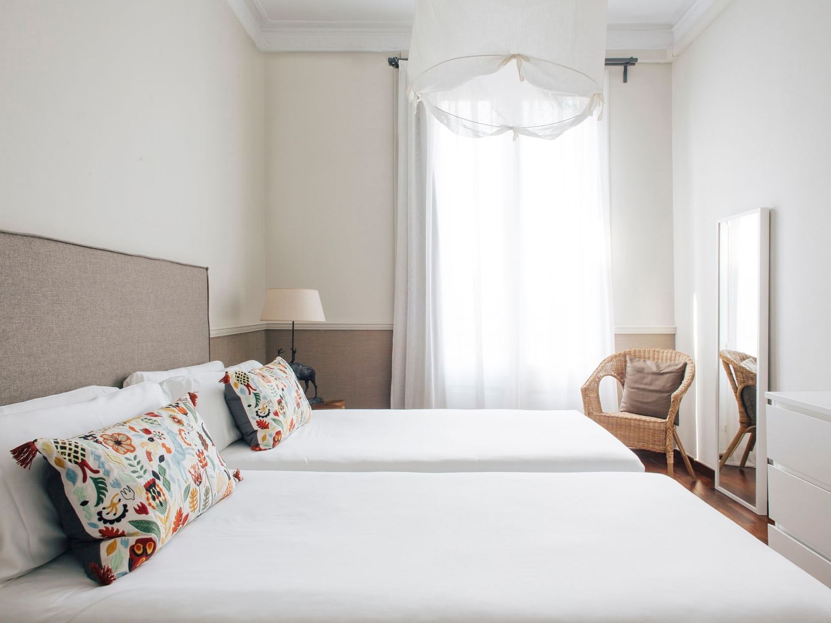 Bedroom arrangement in Deluxe room at Barcelona Apartment