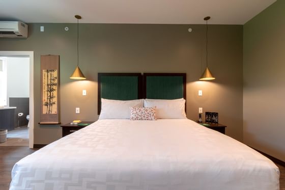 Bed & side cupboards in China-themed Room at The Whittaker Inn