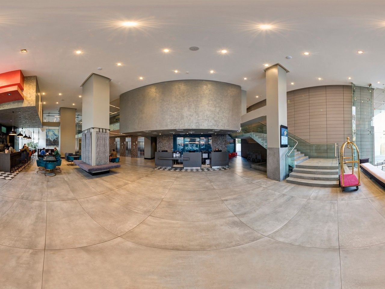 Vista panorámica del vestíbulo con recepción y zona de asientos que destaca hoteles de Chile en Veranda Hotel