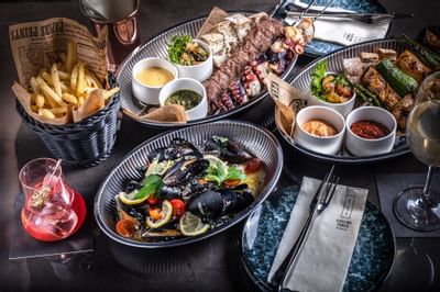 Food served in rooftop bar at Carlton Hotel Bangkok Sukhumvit