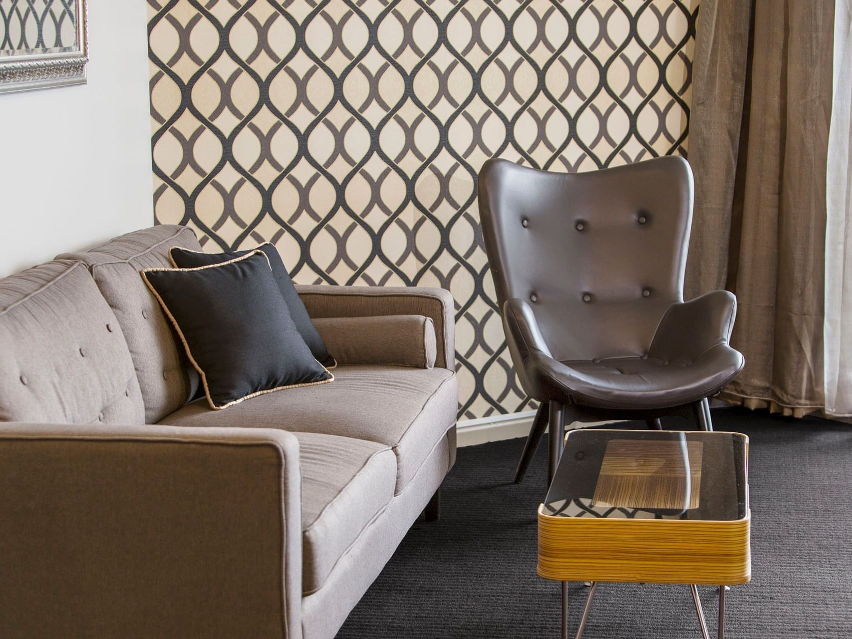 The couch in Superior Suite at Grand Chancellor Brisbane