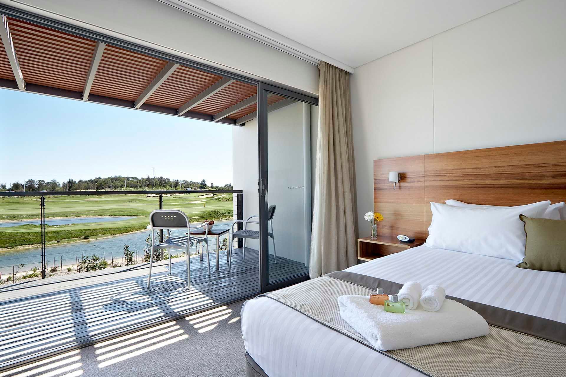 Studio Guestroom Bedroom overlooking lake and golf course