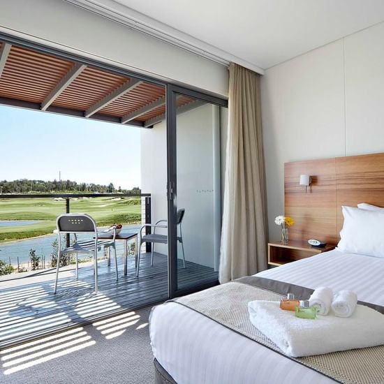 Studio Guestroom with cozy bed at Pullman Magenta Shores Resort