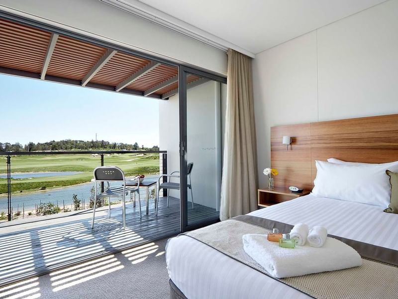 Balcony view of the lake & golf course from Studio Guestroom at Pullman Magenta Shores