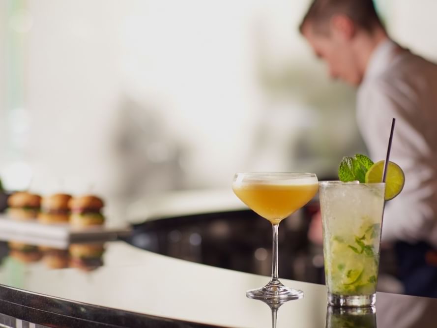 Fresh and tasty drinks in the atrium bar & lounge bartender at Pullman Albert Park