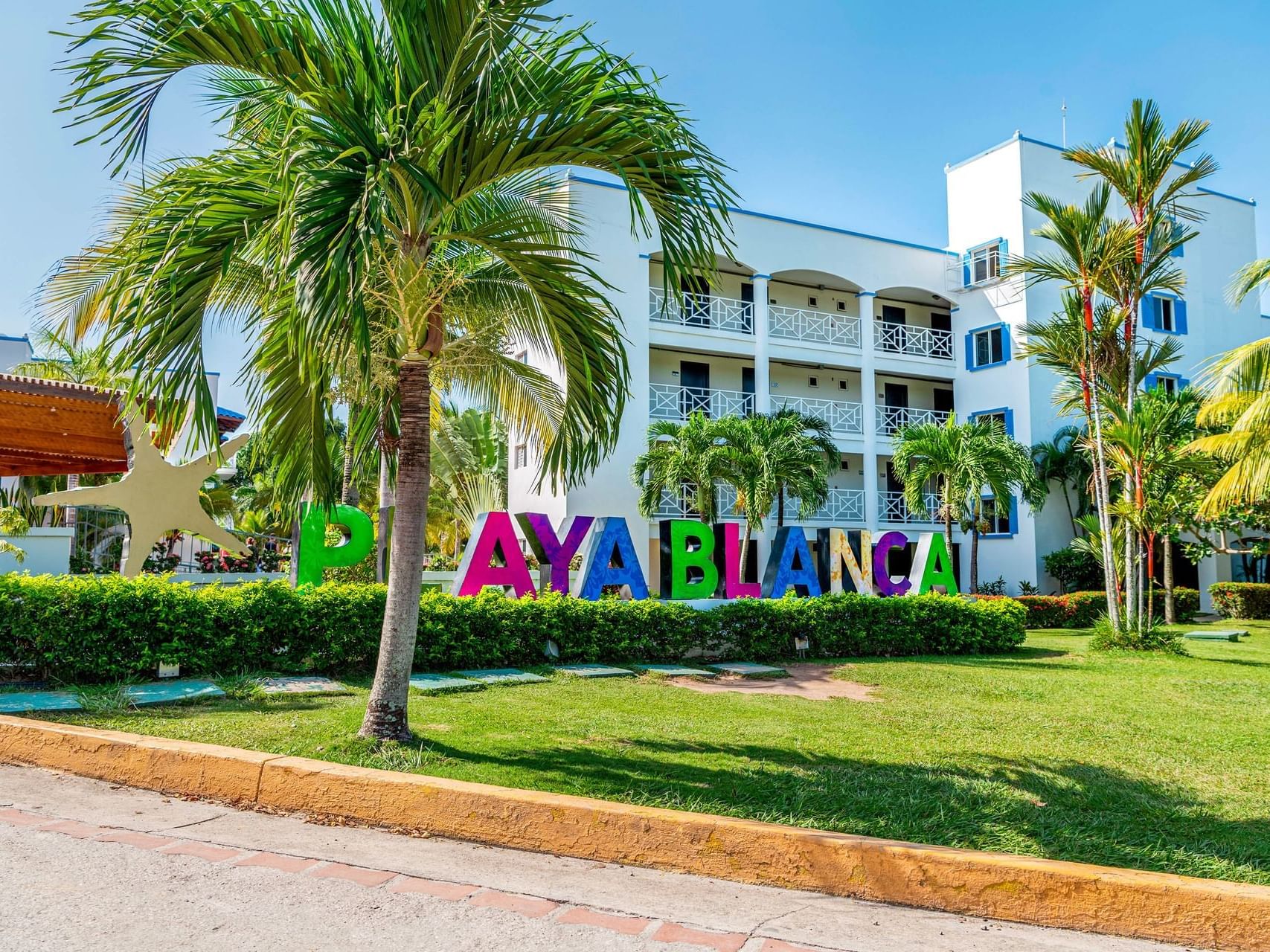 Exterior view of hotel & garden at Playa Blanca Beach Resort