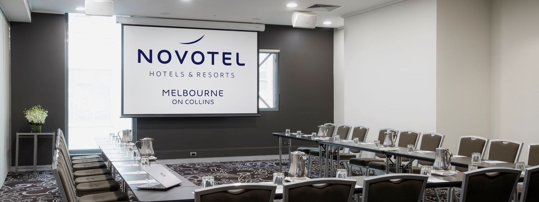U-shaped table setup for a meeting at Novotel Melbourn