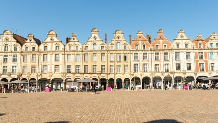 Building front view under blue sky of the Hotel Arras