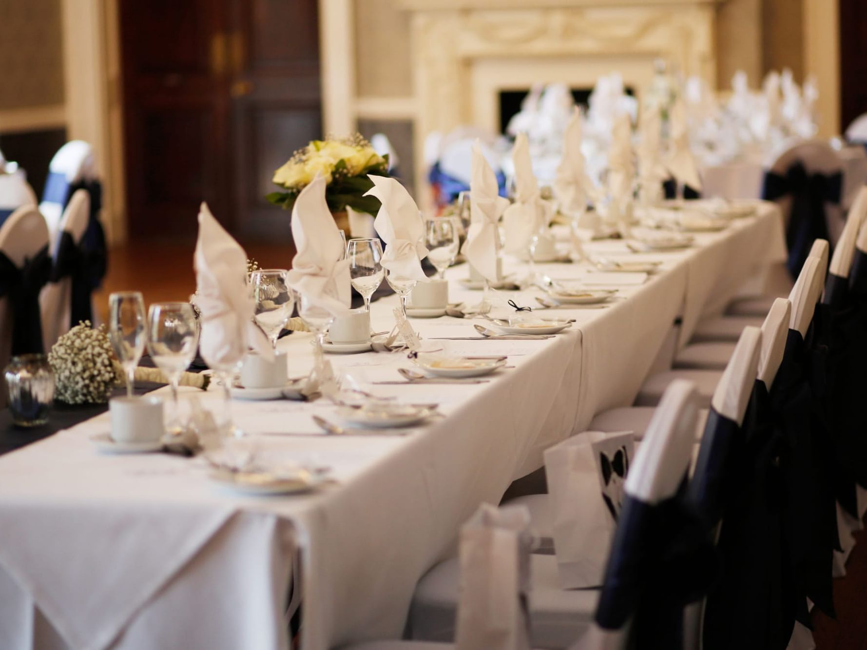 A banquet table arranged for a wedding at Easthampstead Park