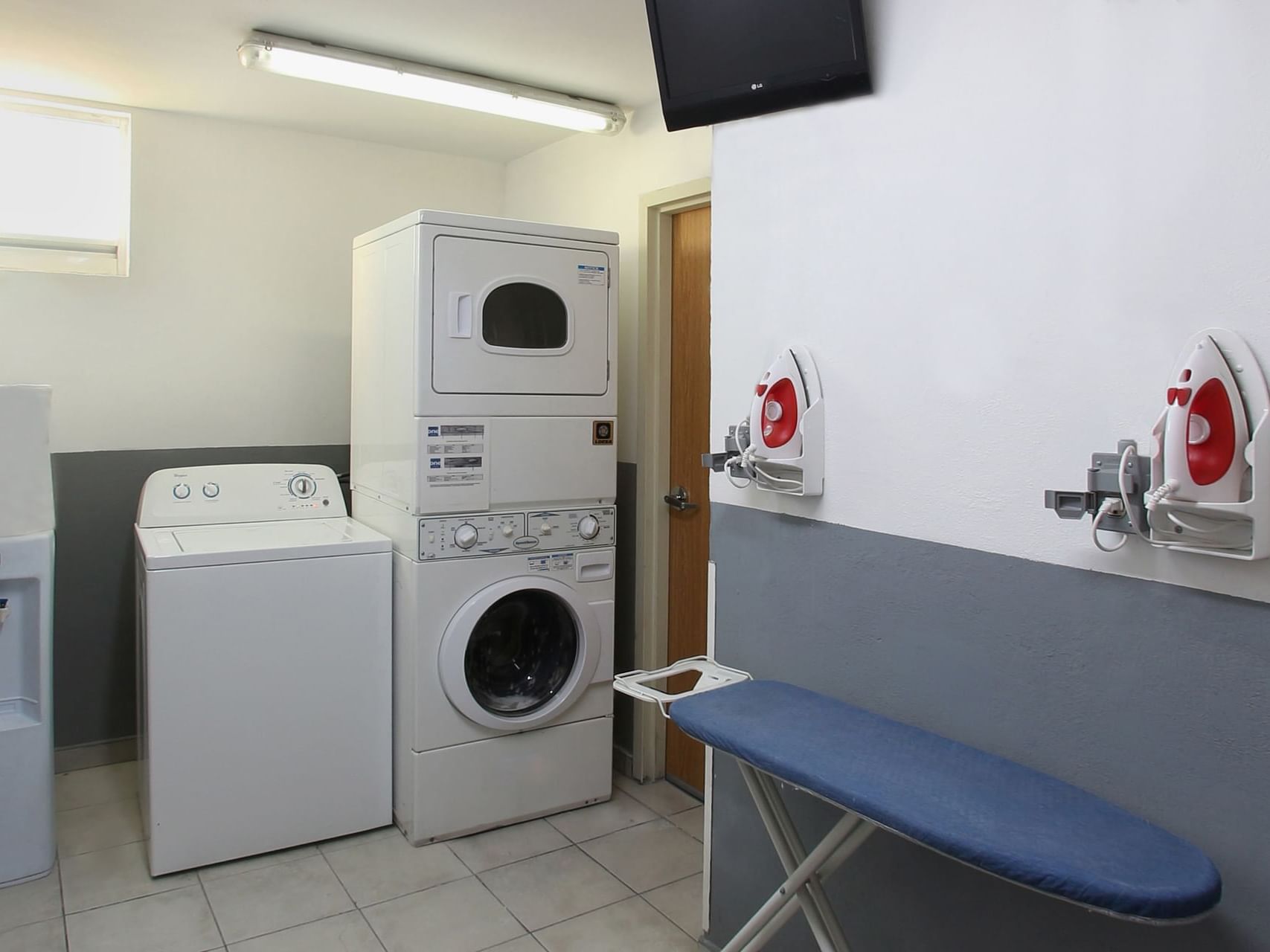 Washing machine, dryer & irons in Laundry Room at One Hotels