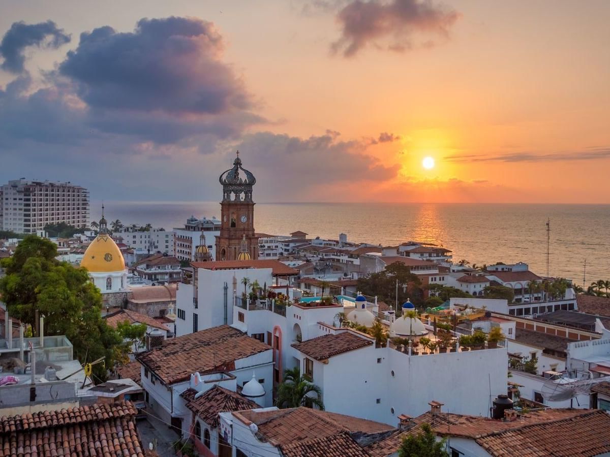 Aerial view of the city near La Colección Resorts at sunset