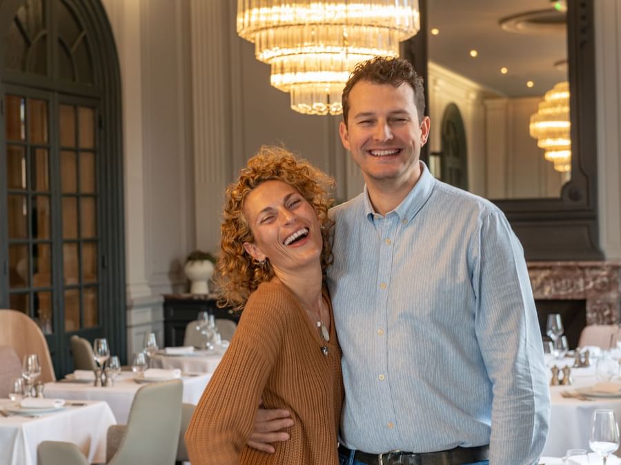 Happy couple in a restaurant at La Maison Rouge
