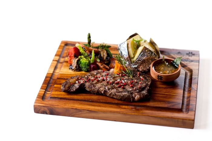 Grilled Steak on a charcuterie board at Hideaway Rio Celeste