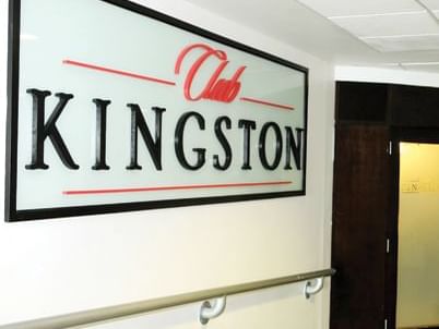 The Club Kingston sign board on a wall at Jamaica Pegasus Hotel