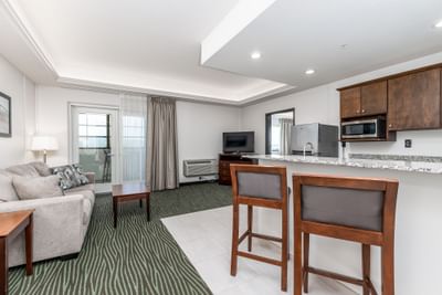 Kitchenette and dining area by the TV lounge area in King Executive Suite River View at Off Shore Resort