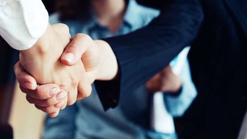 Hand shaking in business meeting at FA Hotels & Resorts