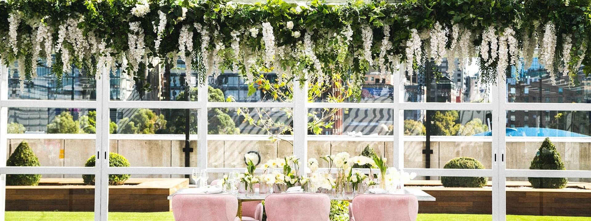 A Dining table arranged in Crown Aviary at Crown Hotel