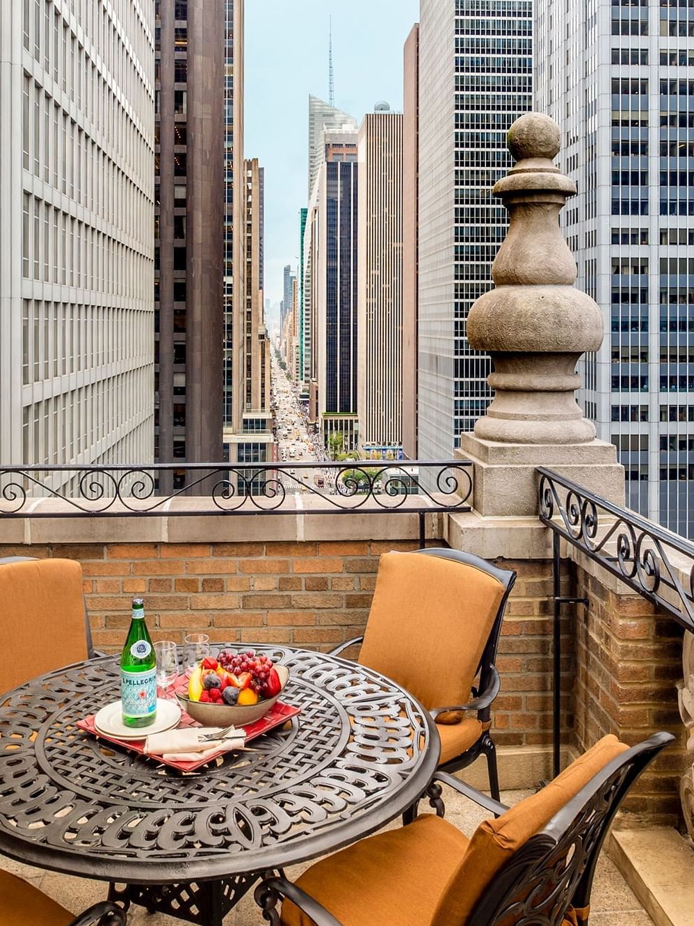 Balcony terrace dining area overlooking the city in Premier City View 2 Double Beds with Terrace at Warwick New York