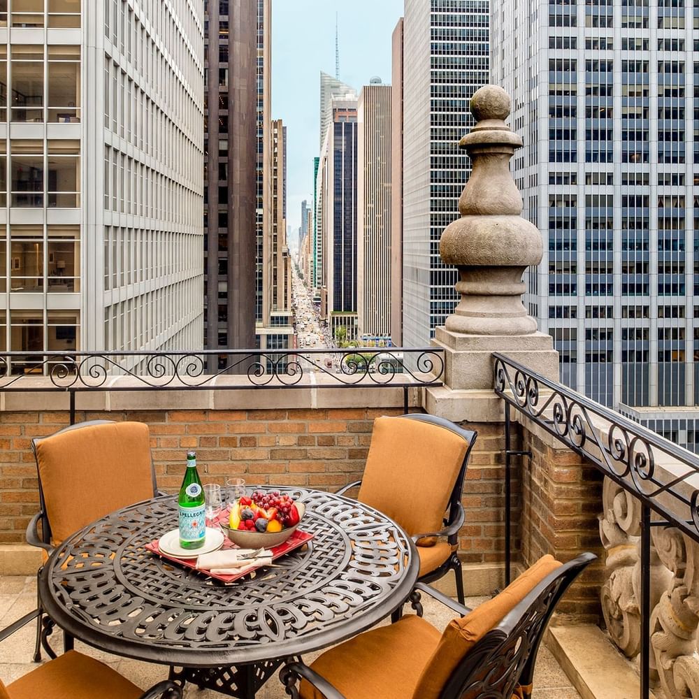 Balcony terrace dining area overlooking the city in Premier City View 2 Double Beds with Terrace at Warwick New York