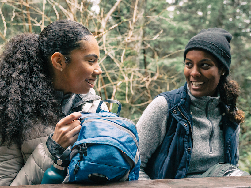 Closeup on two girls ready to travel at Kinship Landing Hotel