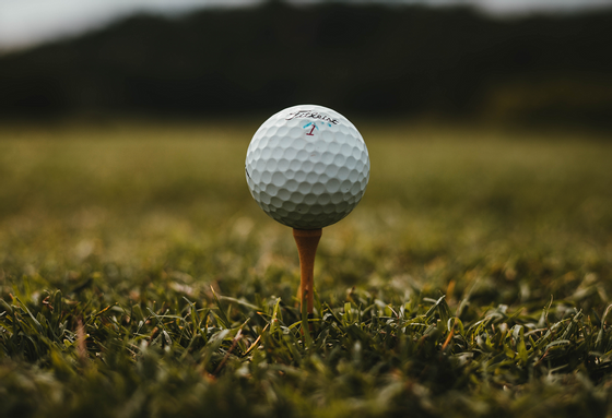 a golf ball on a tee
