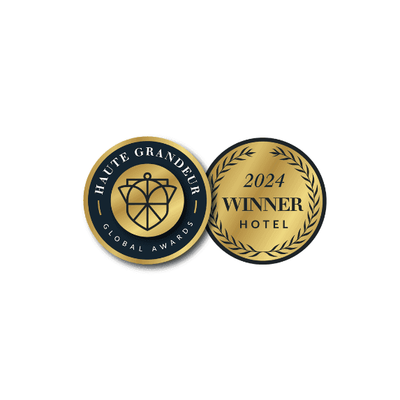 Two gold and black badges for 2024 Winner Hotel at Paradox Vancouver