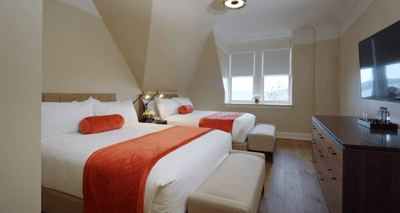 Superior River View Double Queen Room interior at The Abbey Inn