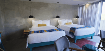 El Doble Room with Double Queen Beds at El Blok Hotel