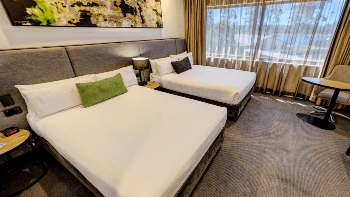 Accessible Superior Double Room with two beds, desk, and large window at Mercure Penrith in Penrith.