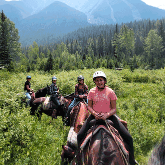 Horseback riders enjoying a mountain trail near Fairmont Hot Springs Resort