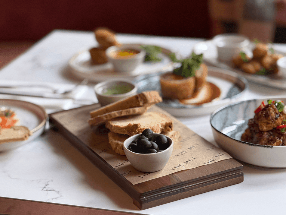Olives and sourdough bread. Get small plates at Gott's bar and kitchen at The Met hotel Leeds