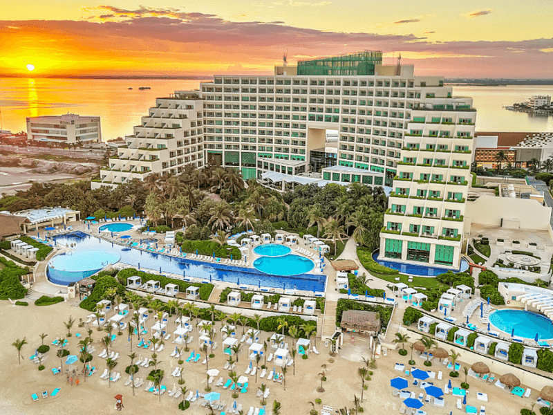 Aerial view of Live Aqua Resorts exterior and outdoor pool