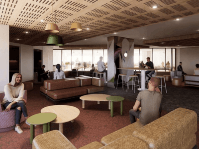 Modern lounge area with seating and tables in UniLodge Brisbane City.