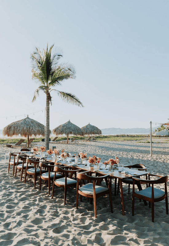 Table arrangement on the beach at Marea Beachfront Villas