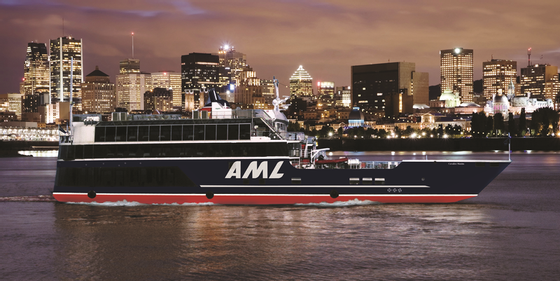 AML Cruises cruise ship at night.