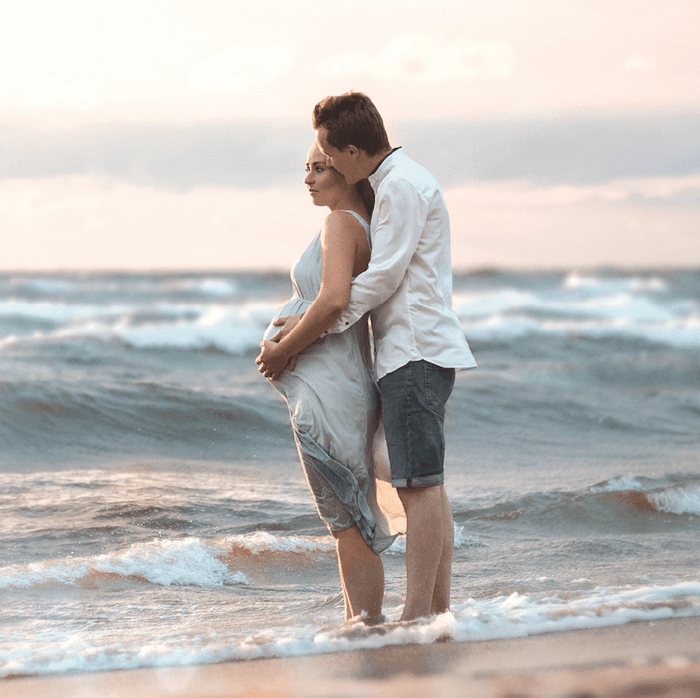 A couple by the beach at Pierre Mundo Imperial