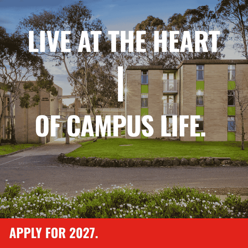 Student residential college with green accents surrounded by trees and lawn at Glenn College campus