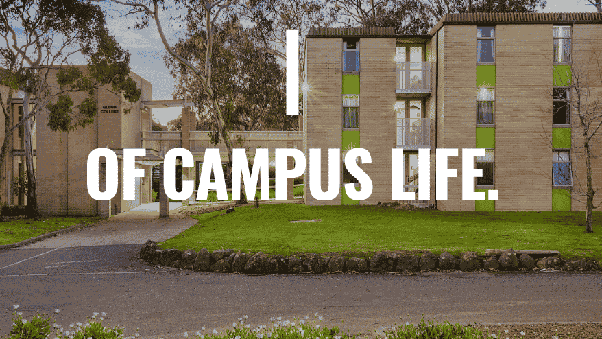 Student residential college with green accents surrounded by trees and lawn at Glenn College campus