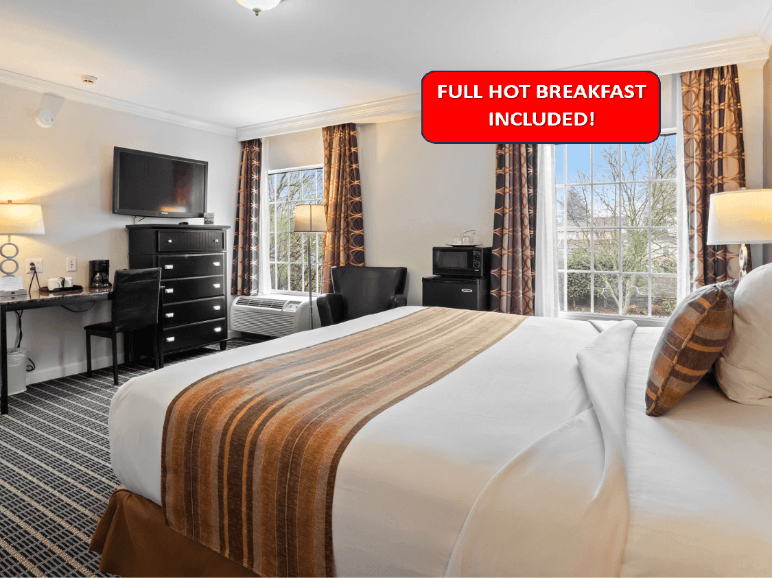 TV & work desk facing king bed in King Superior Accessible at The Wilshire Grand Hotel