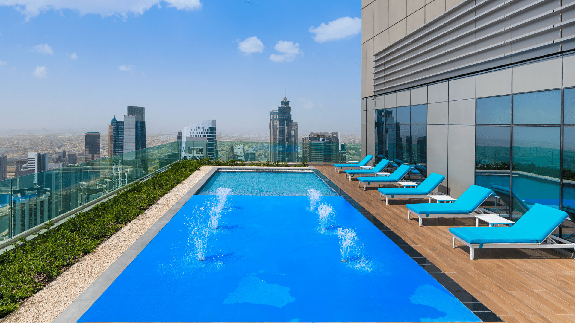 Little kid serving herself some treats from the refreshments corner at Paramount Hotels