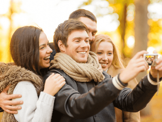 Group of Friends taking Fall Photo