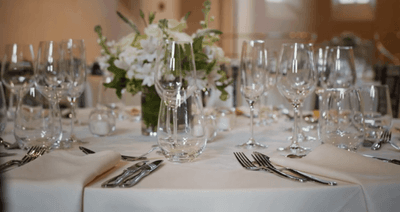 Glasses & cutlery on a table at The Abbey Inn