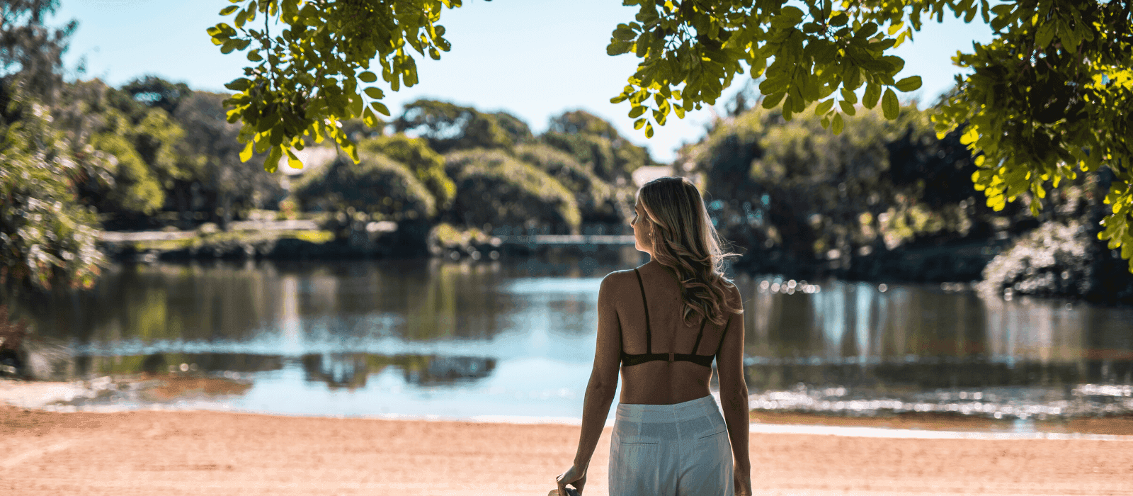 A lady looking at water in Novotel Sunshine Coast Resort 