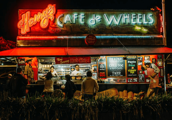 People in Harry's Café de Wheels at Nesuto Woolloomooloo Sydney